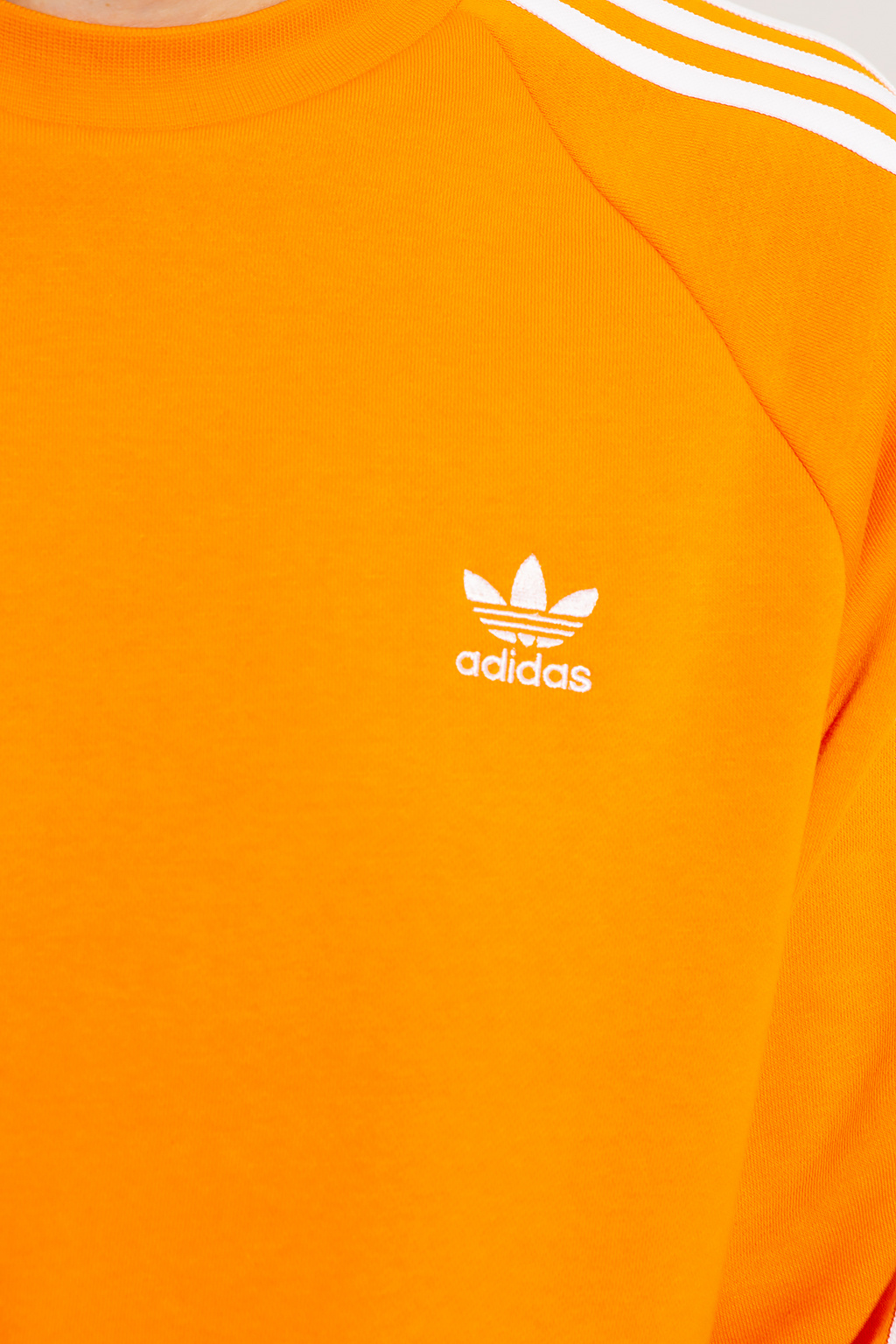 Adidas originals three hotsell stripe sweatshirt in orange